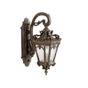 Kichler Tournai wall lantern with ornate Londonderry scrollwork and clear textured glass