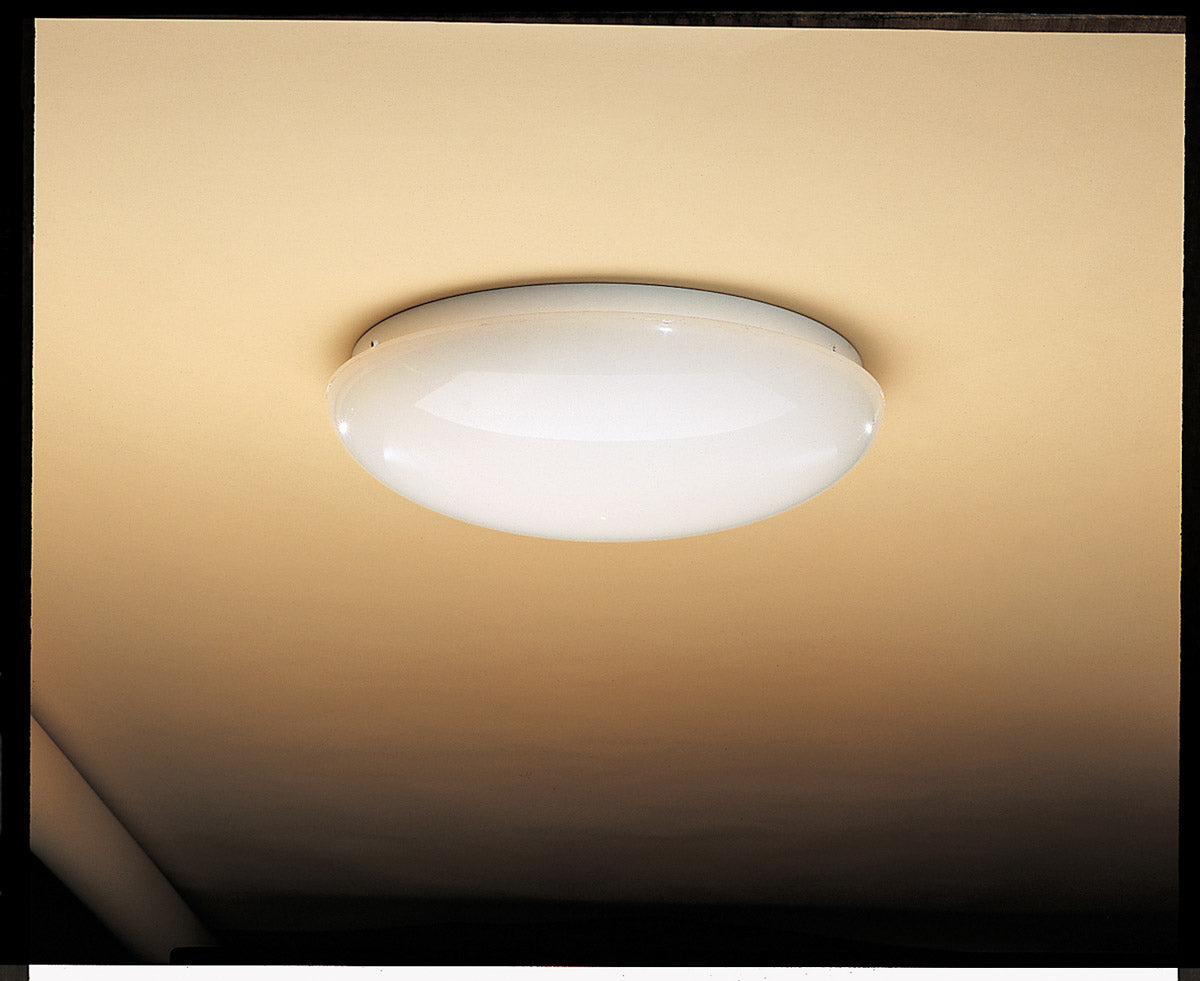 Kichler white dome flush-mount light installed directly against a ceiling