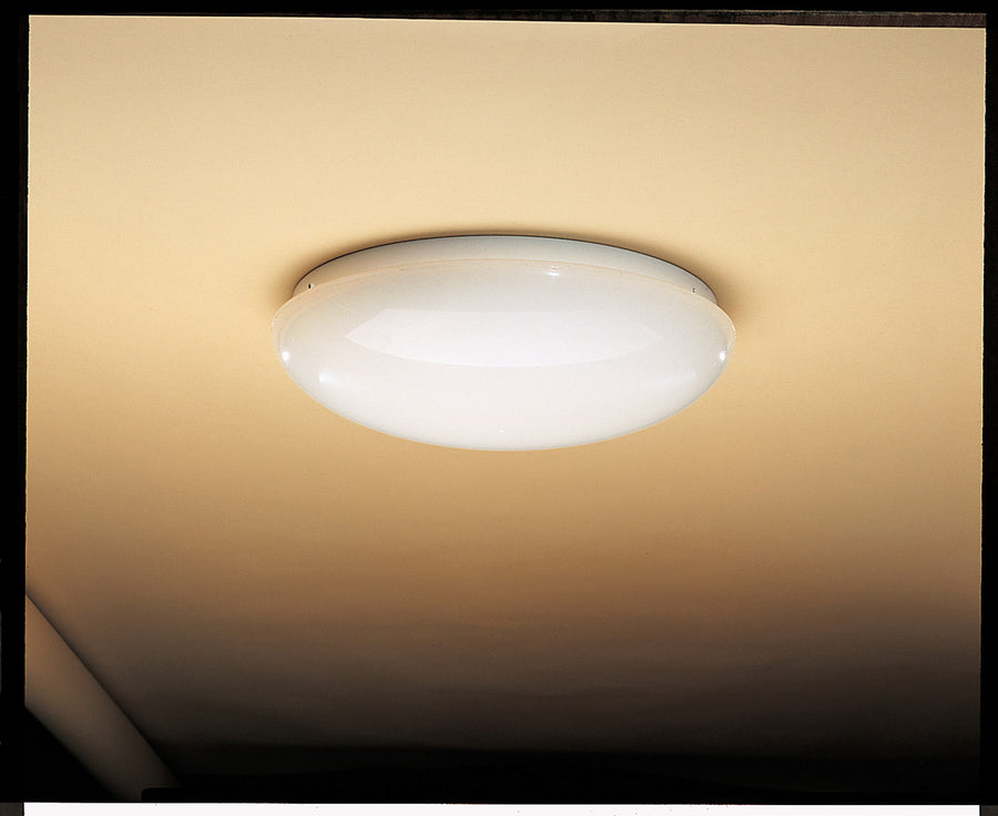 Kichler white dome flush-mount light installed directly against a ceiling