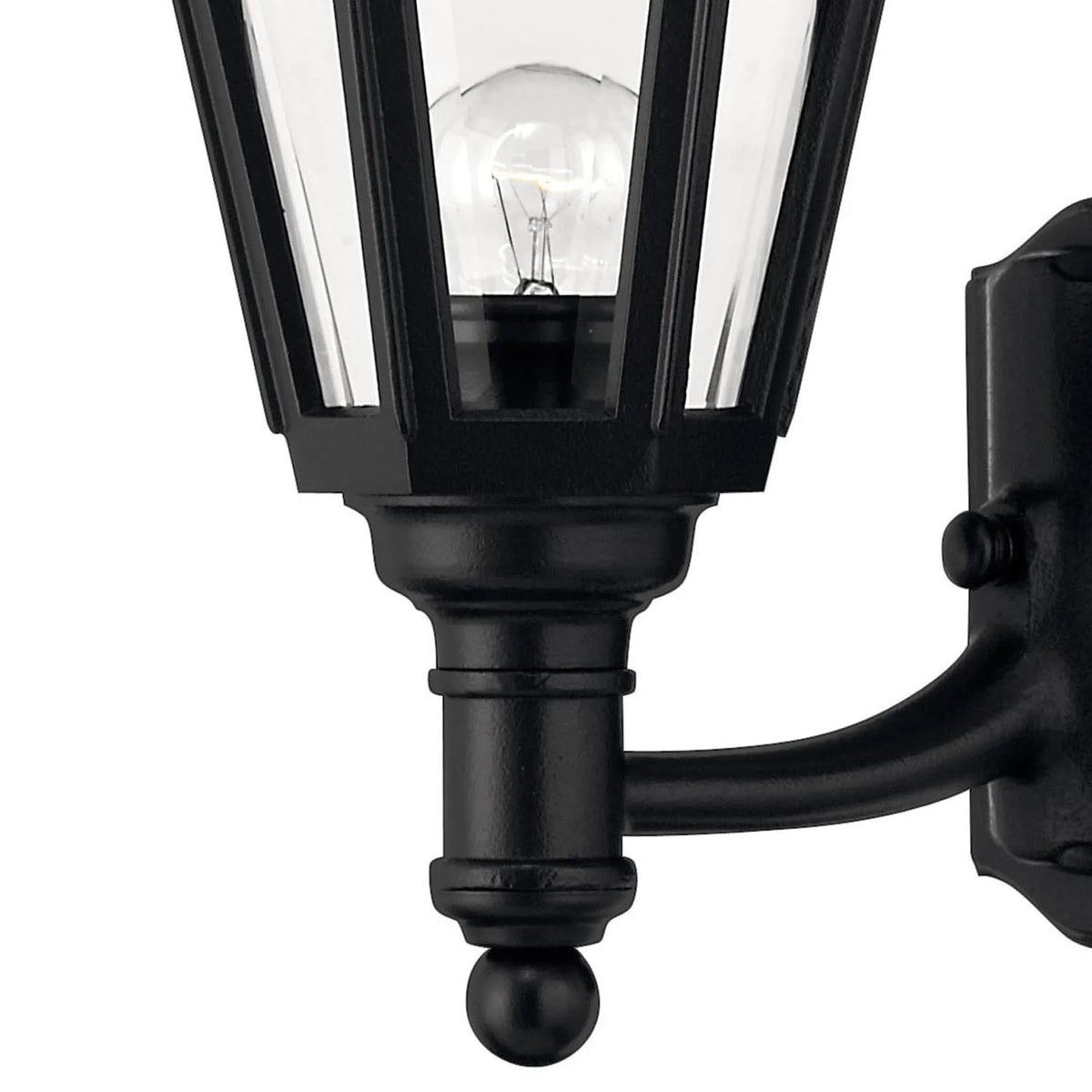 Close view of Manor House 1419BK clear glass, black lower collar, curved arm and wall plate