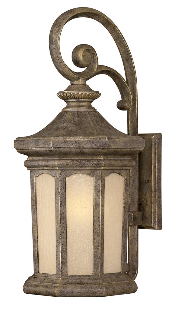 Hinkley Rowe Park wall lantern with a large scroll, broad roof and pale textured glass panels.