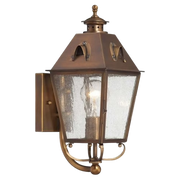 Edenshire 72421-212 wall lantern in English Brass with a tapered glazed body, steep roof and curled supports