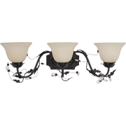 Maxim Elegante vanity light with three cream shades, flowing bronze-toned arms and decorative leaves