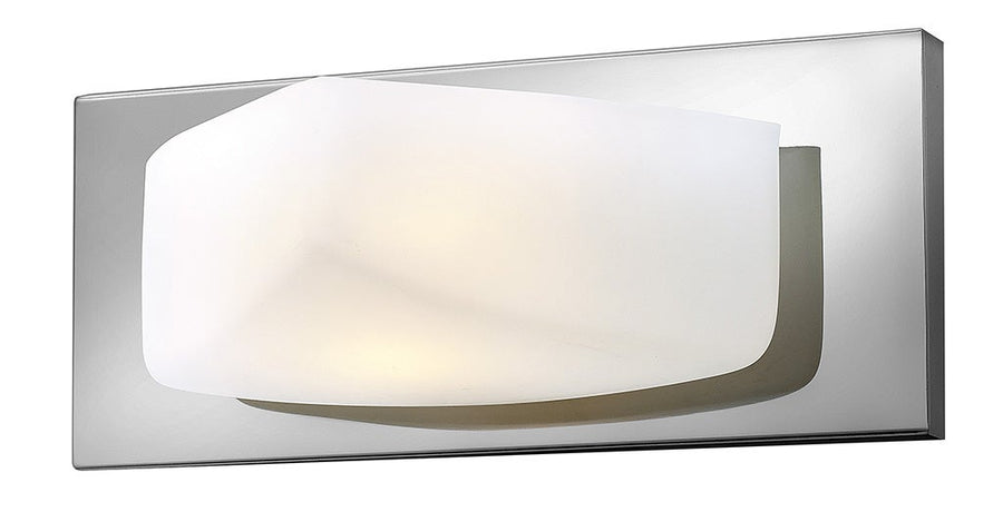 Hinkley Quantum chrome bath fixture with a broad curved pale shade and rectangular backplate