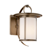 Troy Lighting Wright wall lantern with pale panels, a warm-toned frame and an open ring detail