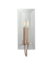 Angled view of Hudson Valley Somers bronze wall sconce with one candle holder reflected in a beveled mirror
