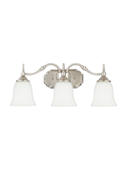 Quoizel Tritan TT8743BN vanity light with three downward white bell shades, a brushed nickel bar and stepped backplate