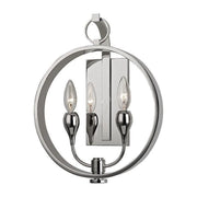 Angled detail of the Dresden circular frame, two candle holders and reflective backplate