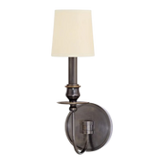Cohasset Old Bronze wall sconce with a tall cream-toned shade, candle stem and curved arm