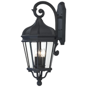 Minka-Lavery Harrison black outdoor wall lantern with a scrolling arm