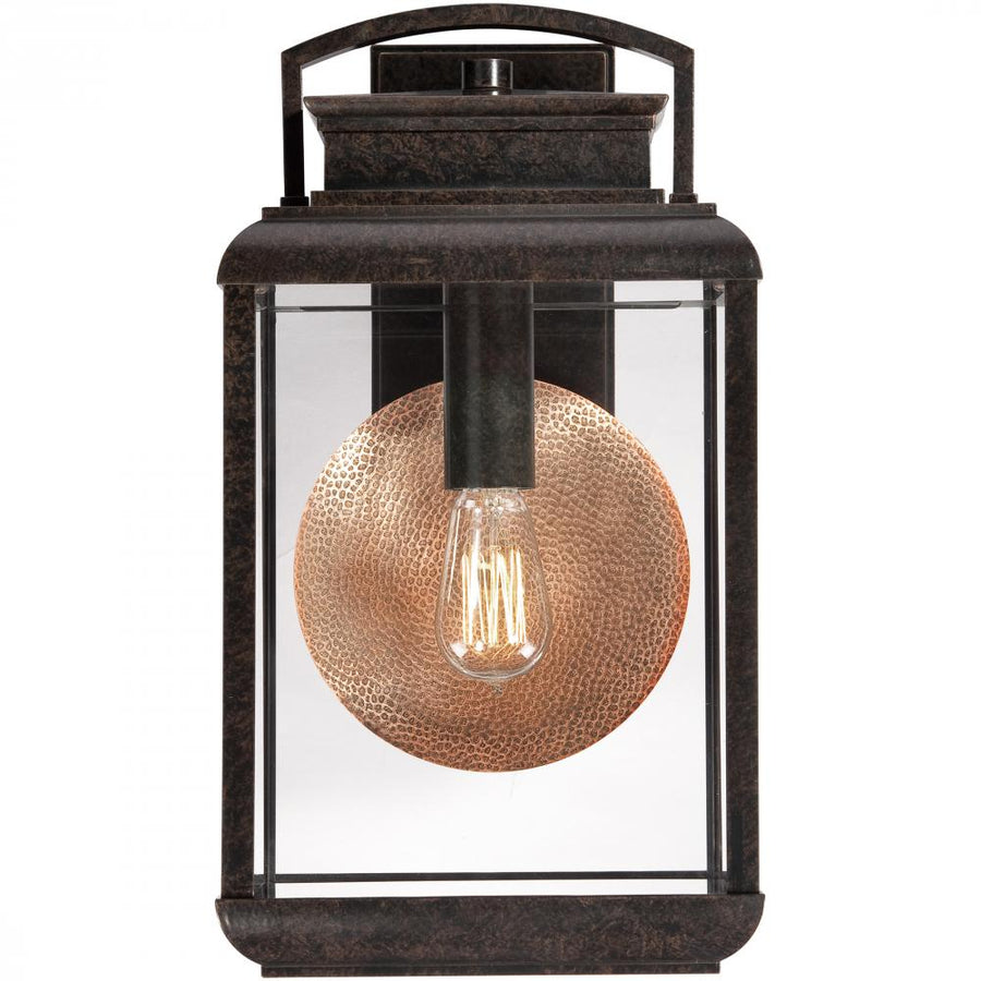 Quoizel Byron BRN8410IB wall lantern, front view with textured circular accent