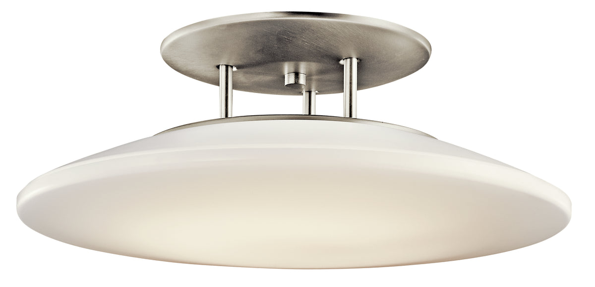 Kichler Ara semi-flush ceiling light with a broad white saucer below brushed nickel canopy and short supports