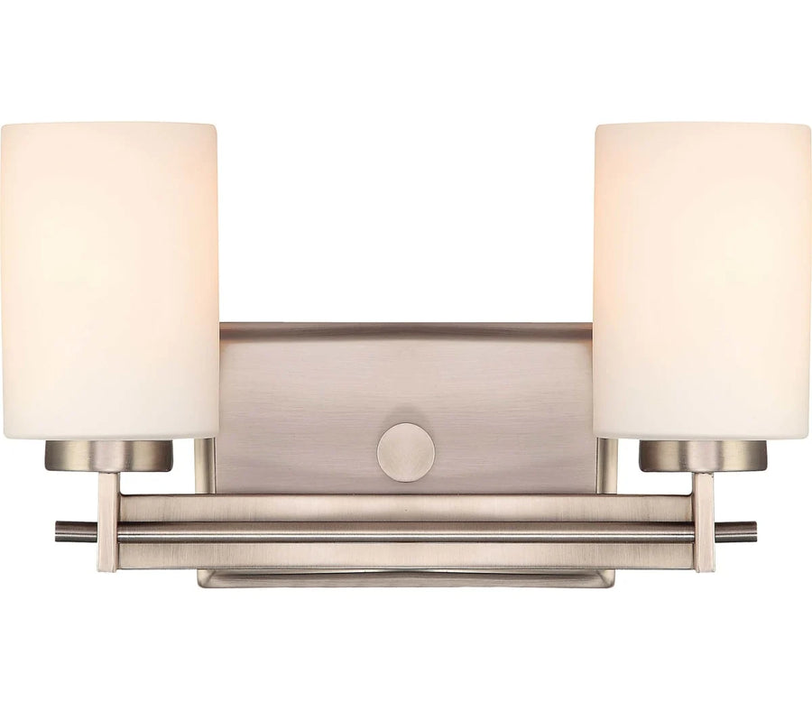 Quoizel Taylor TY8602AN vanity light with two white cylindrical shades and an Antique Nickel double rail