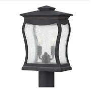 Hinkley Richmond Museum Black post lantern with curved textured glass and candle-style lights.