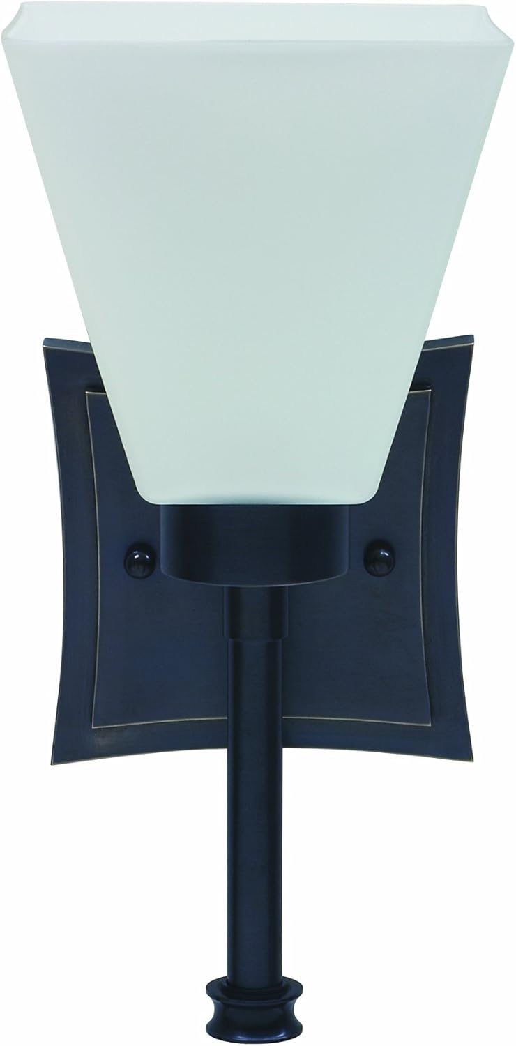 Wall sconce with a flared square white shade, dark bronze stem and shaped square backplate.