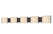 Micro-Pannelli vanity light with five pale curved rectangular shades across a dark bronze horizontal backplate.