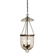 Apothecary pendant with a clear rounded vessel, three candle-style lights and dark bronze cap and chain supports.