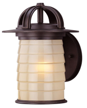 Troy Tiburon B2251ARB wall lantern with a ribbed cream cylinder, bronze cap and arched crown