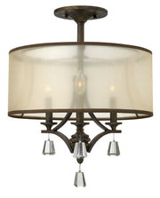 Fredrick Ramond Mime FR45601FBZ three-light French Bronze semi-flush mount with amber sheer shade and crystal accents