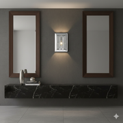 Golden Lighting Smyth chrome wall sconce with a clear glass shade in a steel cage frame