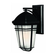 Second Buckley wall-lantern view showing crossing black frame bands and rounded lower cup