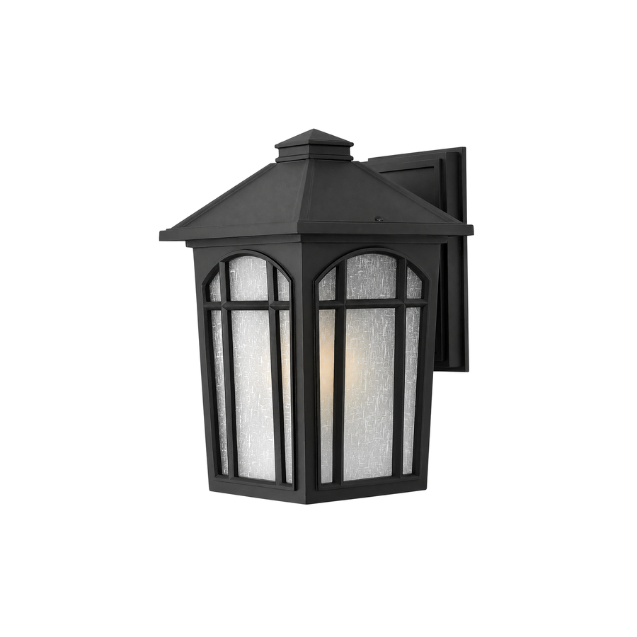 Hinkley Cedar Hill 1984BK black wall lantern with arched pane details and a broad pyramidal roof