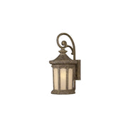 Hinkley Rowe Park 2135PZ wall lantern showing its textured bronze frame, arched panels and sweeping scroll.