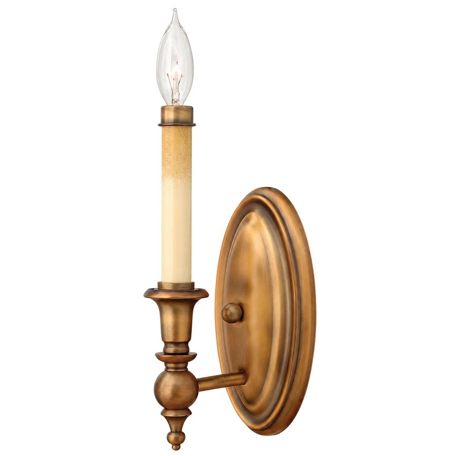 Hinkley Yorktown 3620BR wall sconce with one candle light, a turned cup and stepped bronze backplate