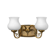 Close view of the Hinkley Olivia bronze vanity light and its traditional scroll detailing.