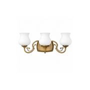Hinkley Olivia brass three-light vanity with scrolling arms and white tulip shades