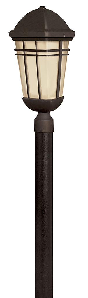 Hinkley Buckley Olde Bronze lantern with pale amber panels, shown on a post