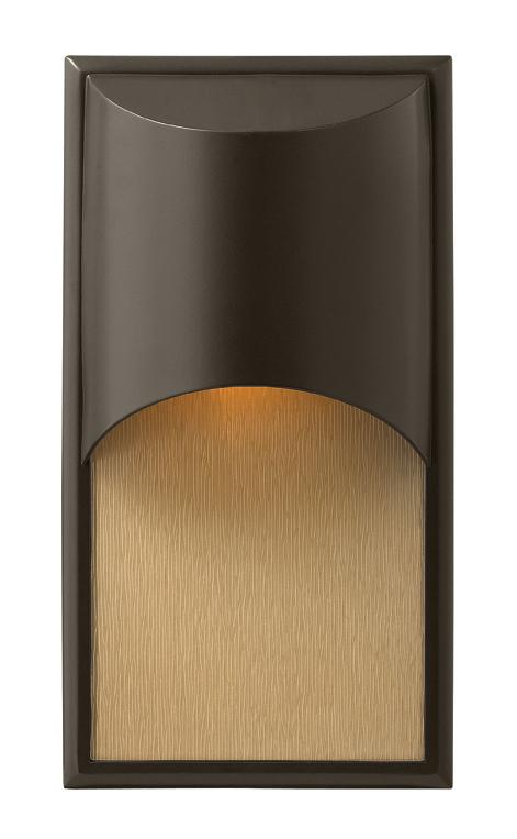 Cascade outdoor wall sconce with a curved bronze shield over an amber textured panel.