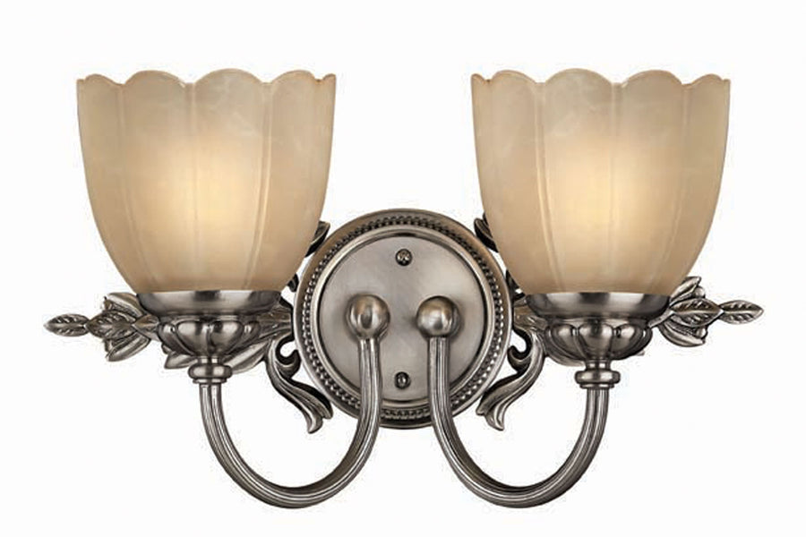 Hinkley Isabella 5392PL vanity light with two scalloped amber-toned shades and antiqued nickel leaf detailing.