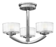 Hinkley Meridian chrome three-light semi-flush mount with cylindrical shades
