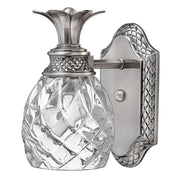 Hinkley Plantation wall sconce with pineapple-shaped clear glass and polished antique nickel leaf details