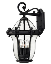 Hinkley San Clemente Museum Black wall lantern with clear glass and three candle lights