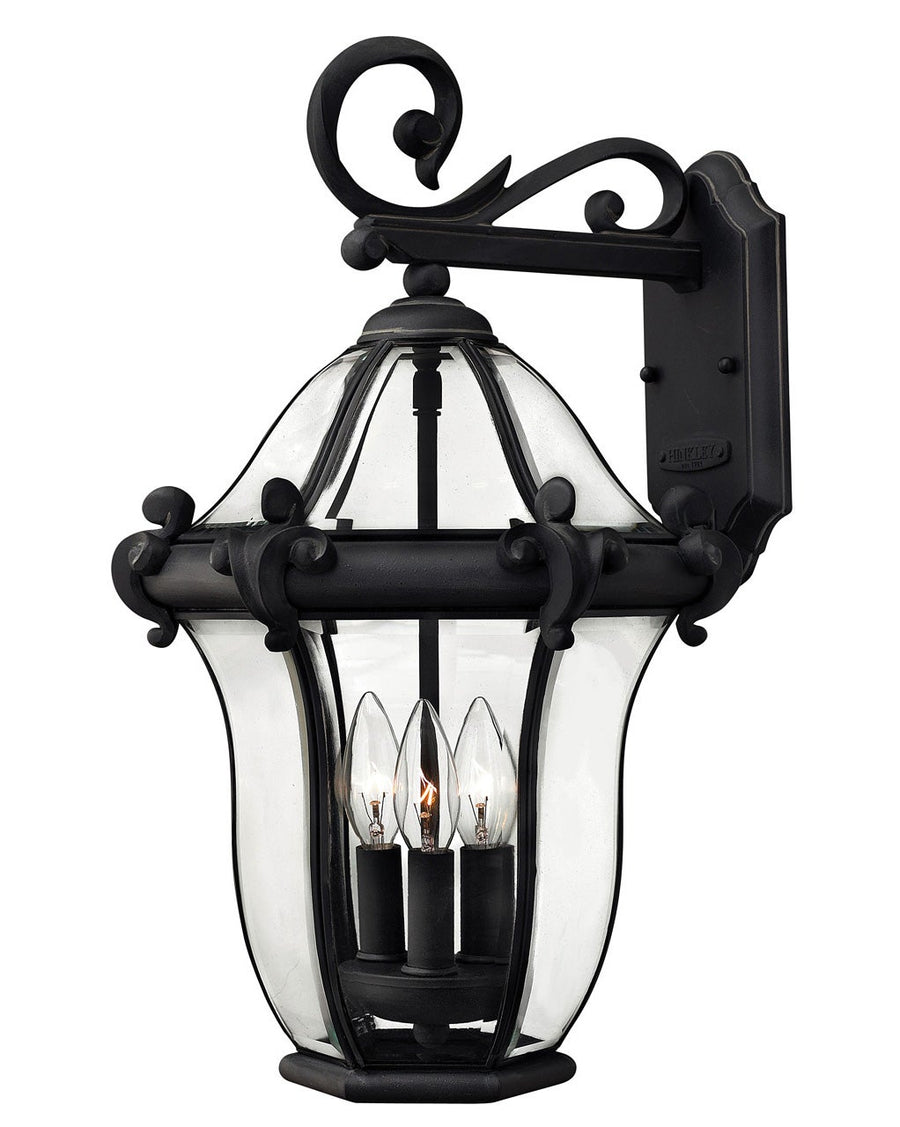 Hinkley San Clemente Museum Black wall lantern with clear glass and three candle lights