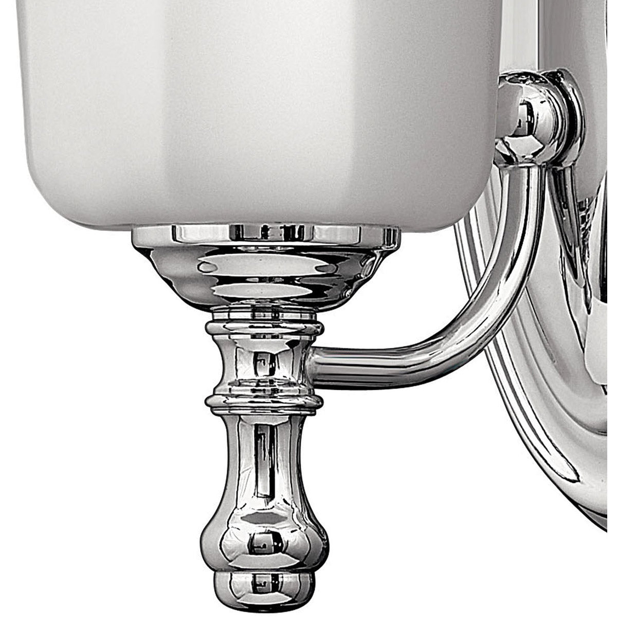 Hinkley Shelly sconce detail showing its chrome cup, turned collar and pointed finial