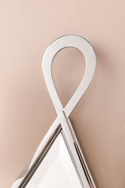 Detail of Cambria 702-PN polished ribbon loop and beveled mirror