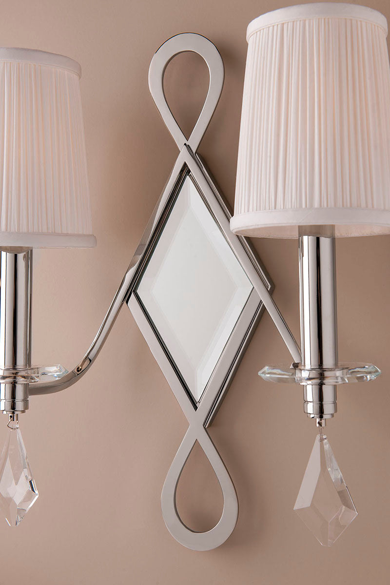 Installed Cambria 702-PN wall sconce showing mirrored centre and faceted pendants