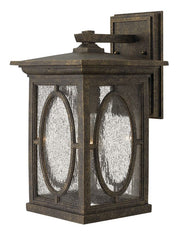 Hinkley Randolph Autumn wall lantern with bold oval pane details and a stepped rectangular roof