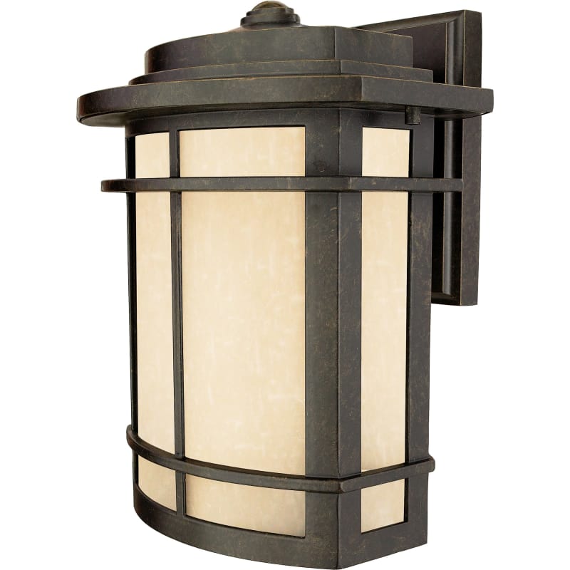 Galen wall lantern with a bronze stepped roof, horizontal rails and pale textured glass panels.