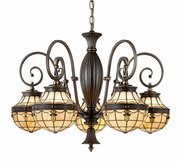 Kichler Trent 66029 chandelier with five patterned stained-glass-style shades and scrolling arms