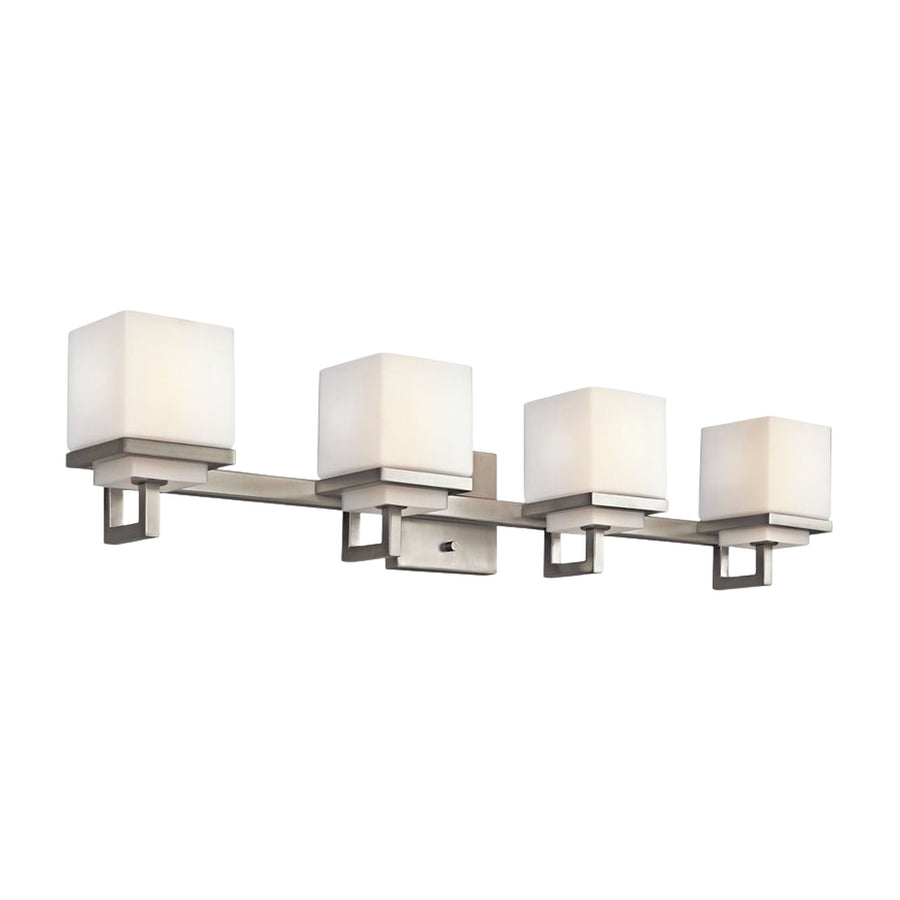 Kichler Metro Park vanity bar showing the straight silver frame, rectangular backplate and four cubic shades