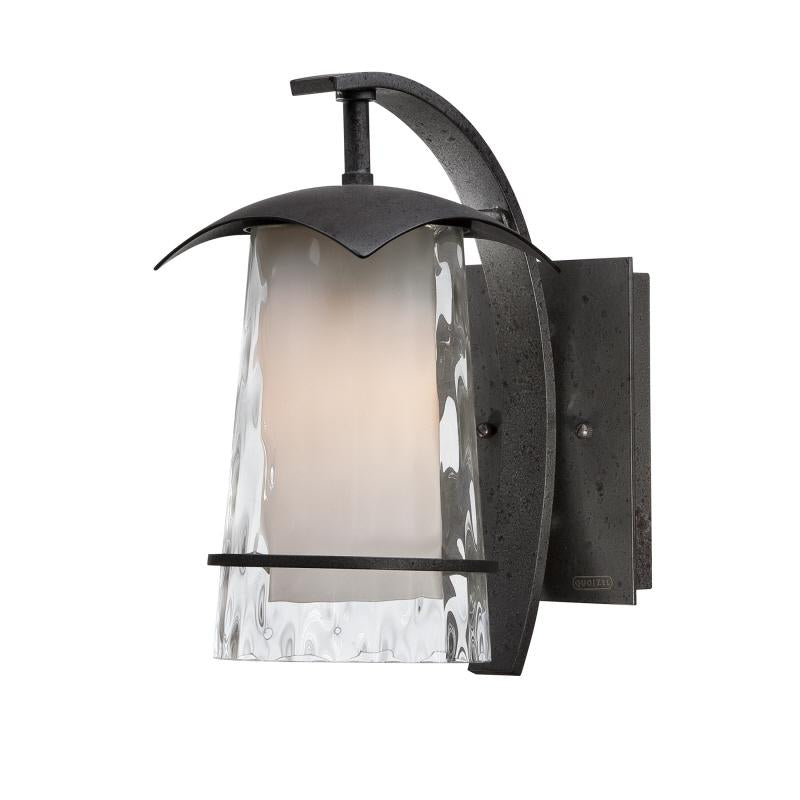 Quoizel Mayfair wall lantern with curved dark support, rippled outer glass and a pale inner diffuser.