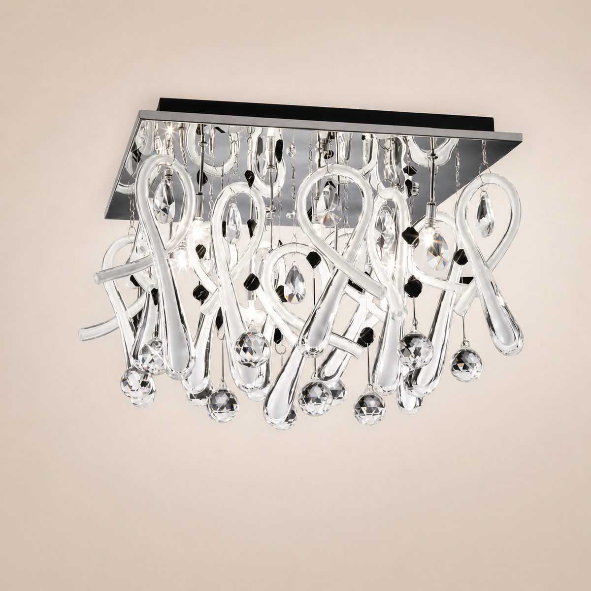 Mantra Class 0727 flush mount with clear loops, faceted drops and small black accents beneath a square canopy.