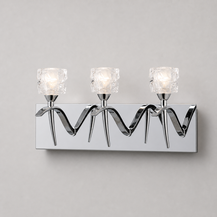 Mantra Viena chrome wall light with clear faceted shades across a long mirrored backplate
