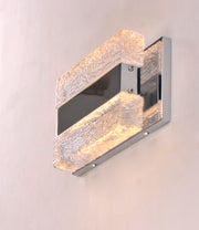 Low side-angle view of the Maxim Ice wall light showing textured block depth and projecting centre housing.