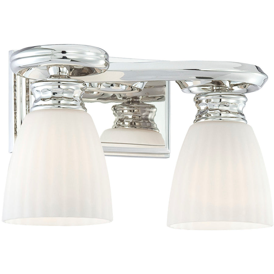 Alternate view of the Metropolitan vanity light showing two flared shades and reflections in its nickel backplate