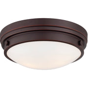 Minka-Lavery Lathan Bronze flush mount showing its layered rim and softly curved white diffuser